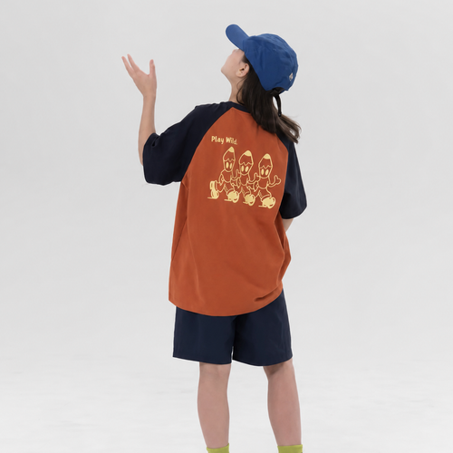 Play Wild kids quick-dry raglan tee in burnt orange and navy, back view
